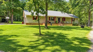 Country Home with Wooded Riding Trails and a Workshop on 22.76 Acres in Savannah, Tennessee — 9,000