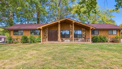 Rustic Country Home with 29.8 Acres, Cypress Siding and Multiple Outbuildings in Scotts Hill, Tennessee — 9,900